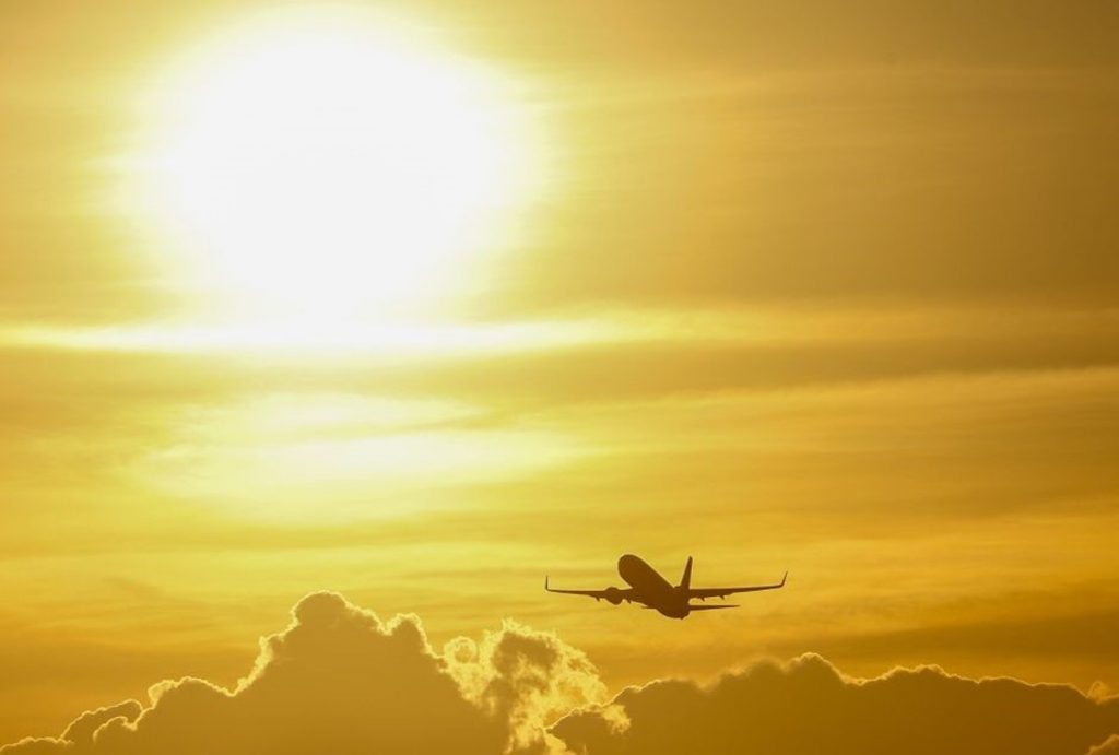 airplane in the sky 1200x810