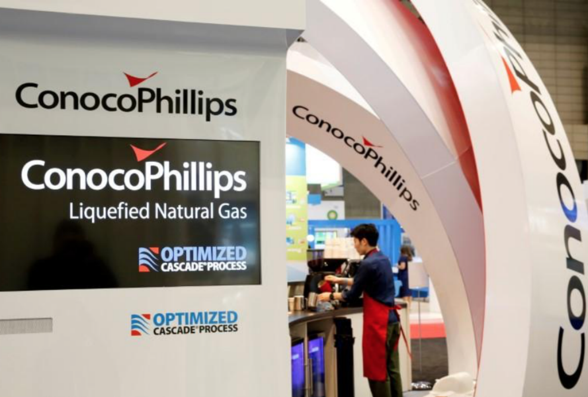 FILE PHOTO: Logos of ConocoPhillips are seen in its booth at Gastech, the world's biggest expo for the gas industry, in Chiba, Japan, April 4, 2017. REUTERS/Toru Hanai/File Photo - RC11AEA51EE0