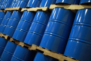 global oil market faces a million barrel glut next year, says iea oil drums barrels of oil 1200x810