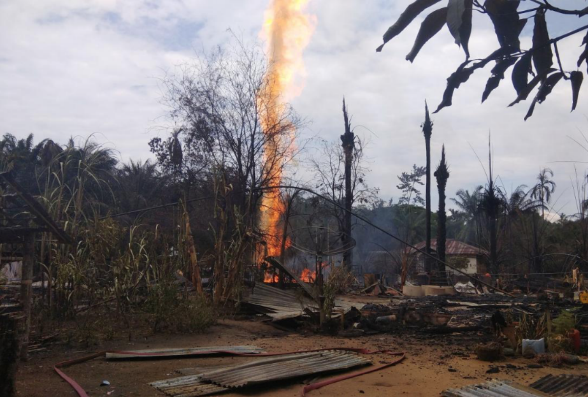 Flames from a burning oil well are seen at a village in Ranto Peureulak, Aceh Province, Indonesia April 25, 2018 in this photo taken by Antara Foto. Antara Foto/Maulana/ via REUTERS