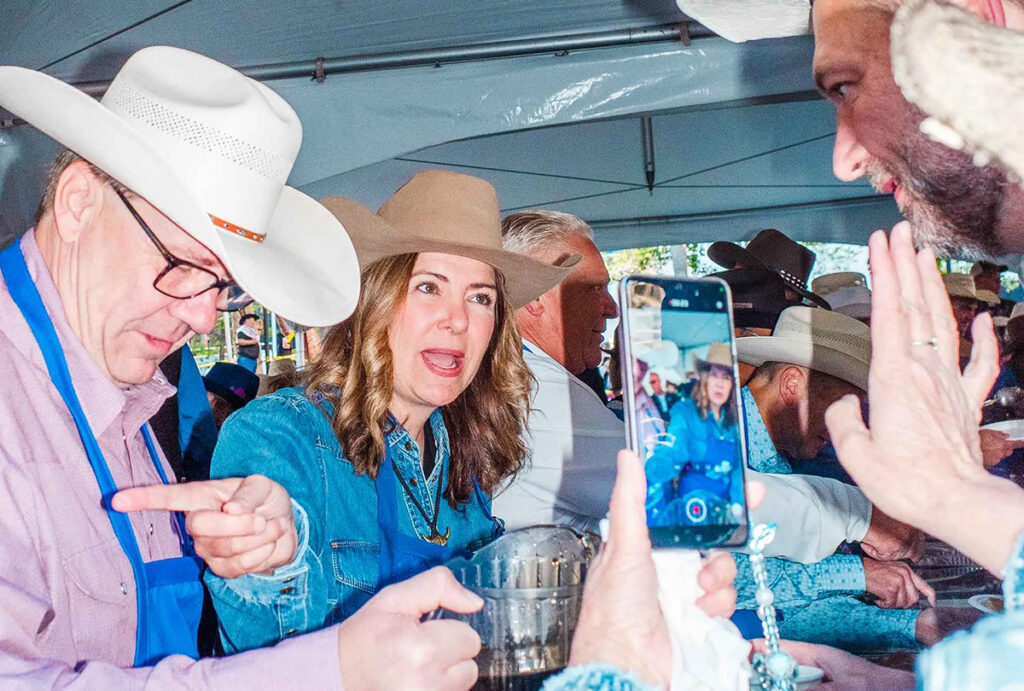 smith at a pancake breakfast during the calgary stampede 1200x810
