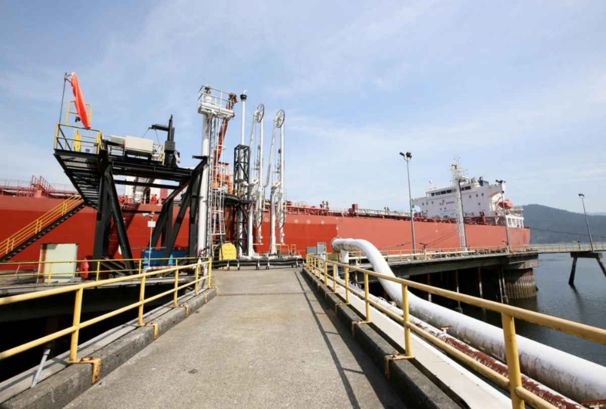 FILE PHOTO: A tanker docks at Westridge Terminal, the loading area for Kinder Morgan's Trans Mountain pipeline in Burnaby, British Columbia, Canada in a May 10, 2013 file photo. Kinder Morgan Canada/Handout/File Photo via REUTERS